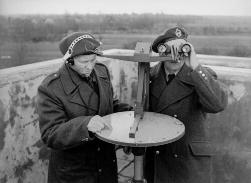 Volunteers of the Dutch Observer Corps on their post